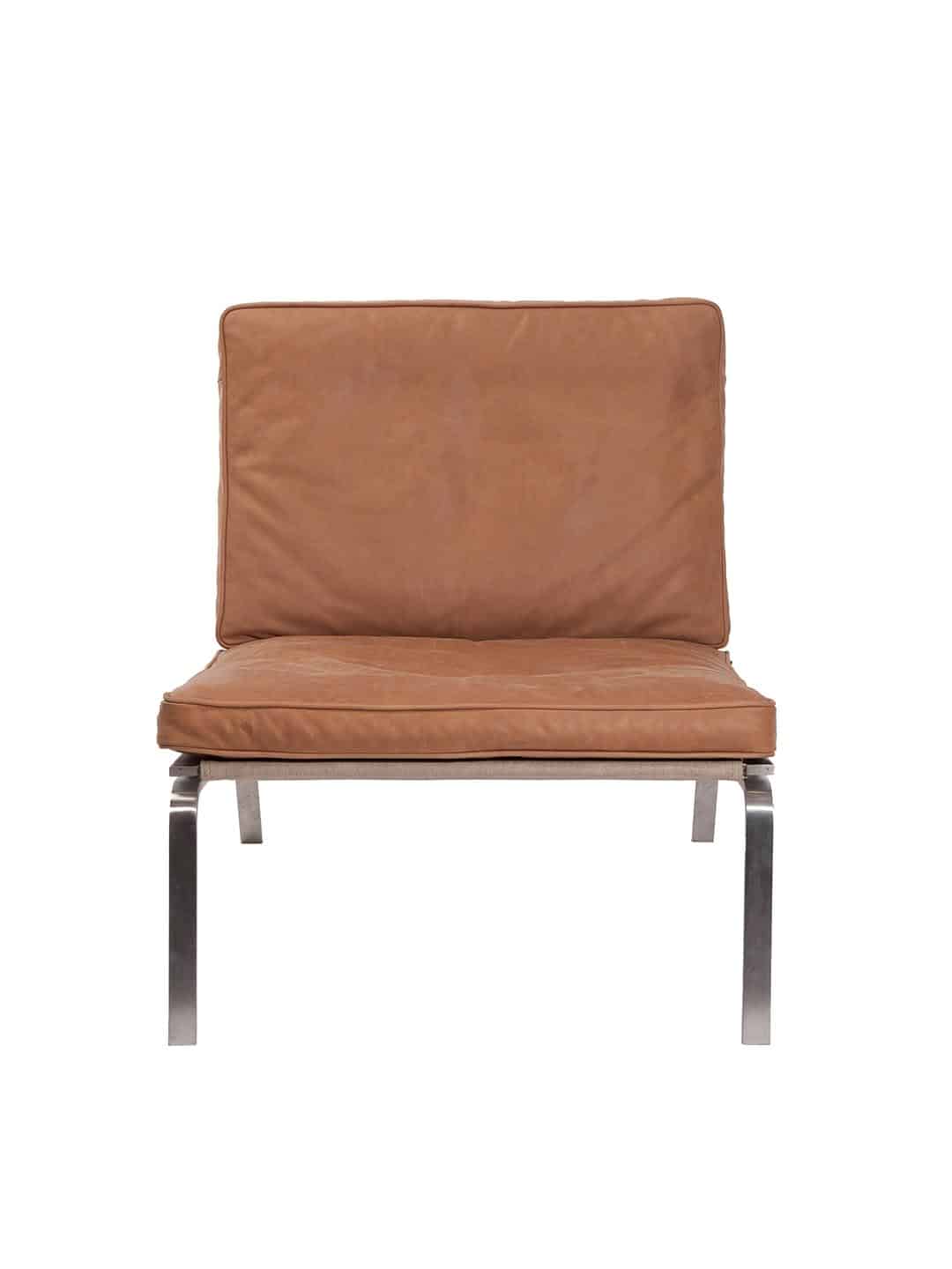 Красивое кресло NORR11 Man из кожи желто-коричневого цвета