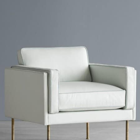 Стильное кресло Garsnas Colette easy небесно-голубого цвета в скандинавском интерьере