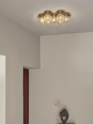 Дорогой потолочный светильник Nuura Liila Star в минималистичном интерьере